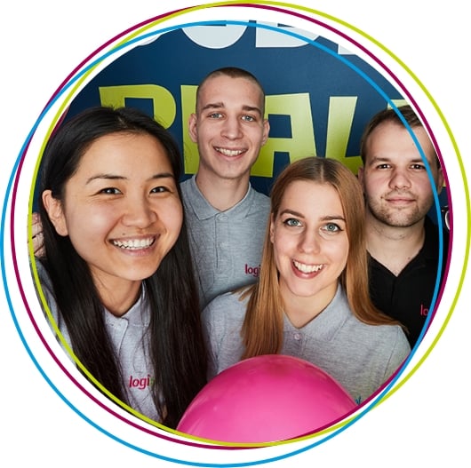 laughing teens in gray t-shirt with pink balloon